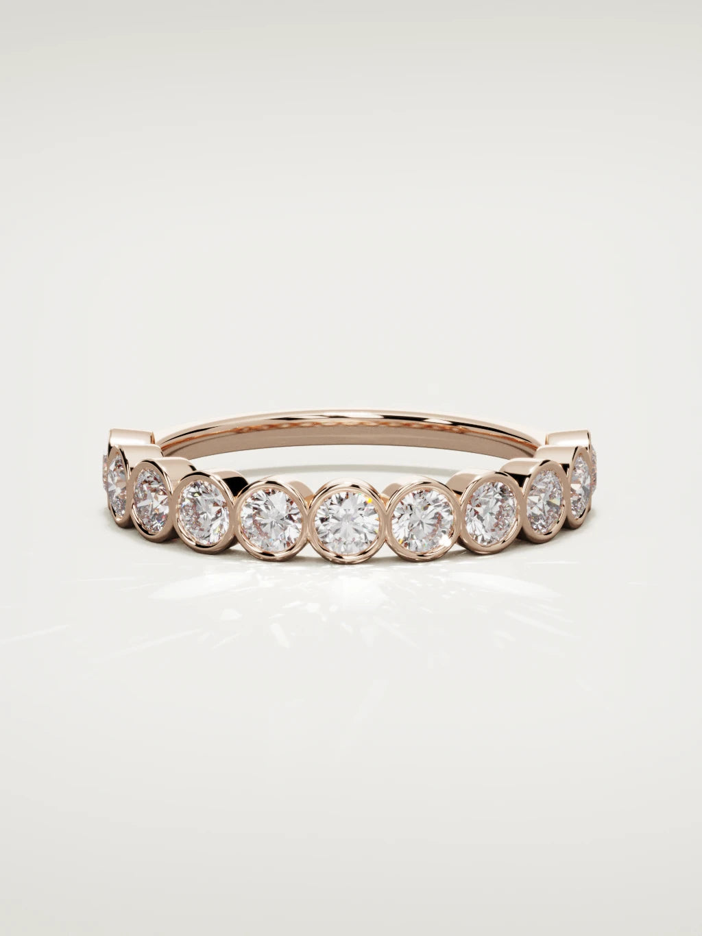 The Perla bezel bubble half eternity band in 14K rose gold, front view