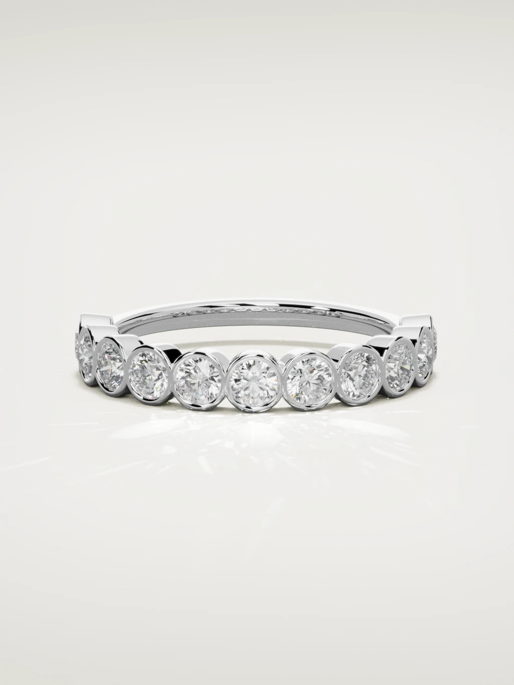 The Perla bezel bubble half eternity band in 14K white gold, front view