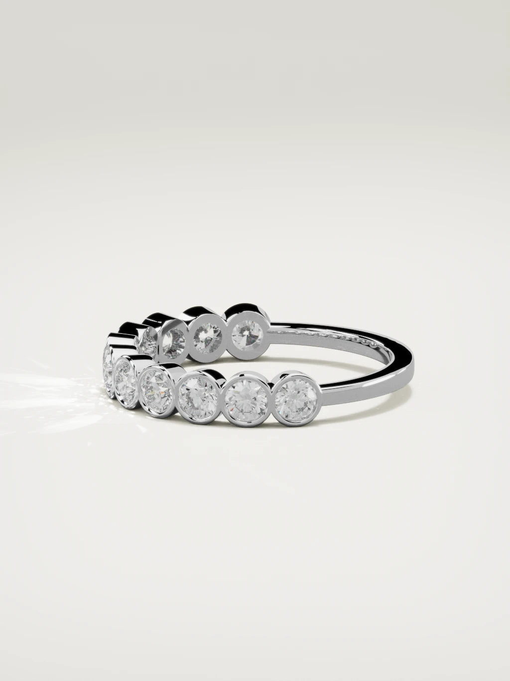 The Perla bezel bubble half eternity band in 14K white gold, side view