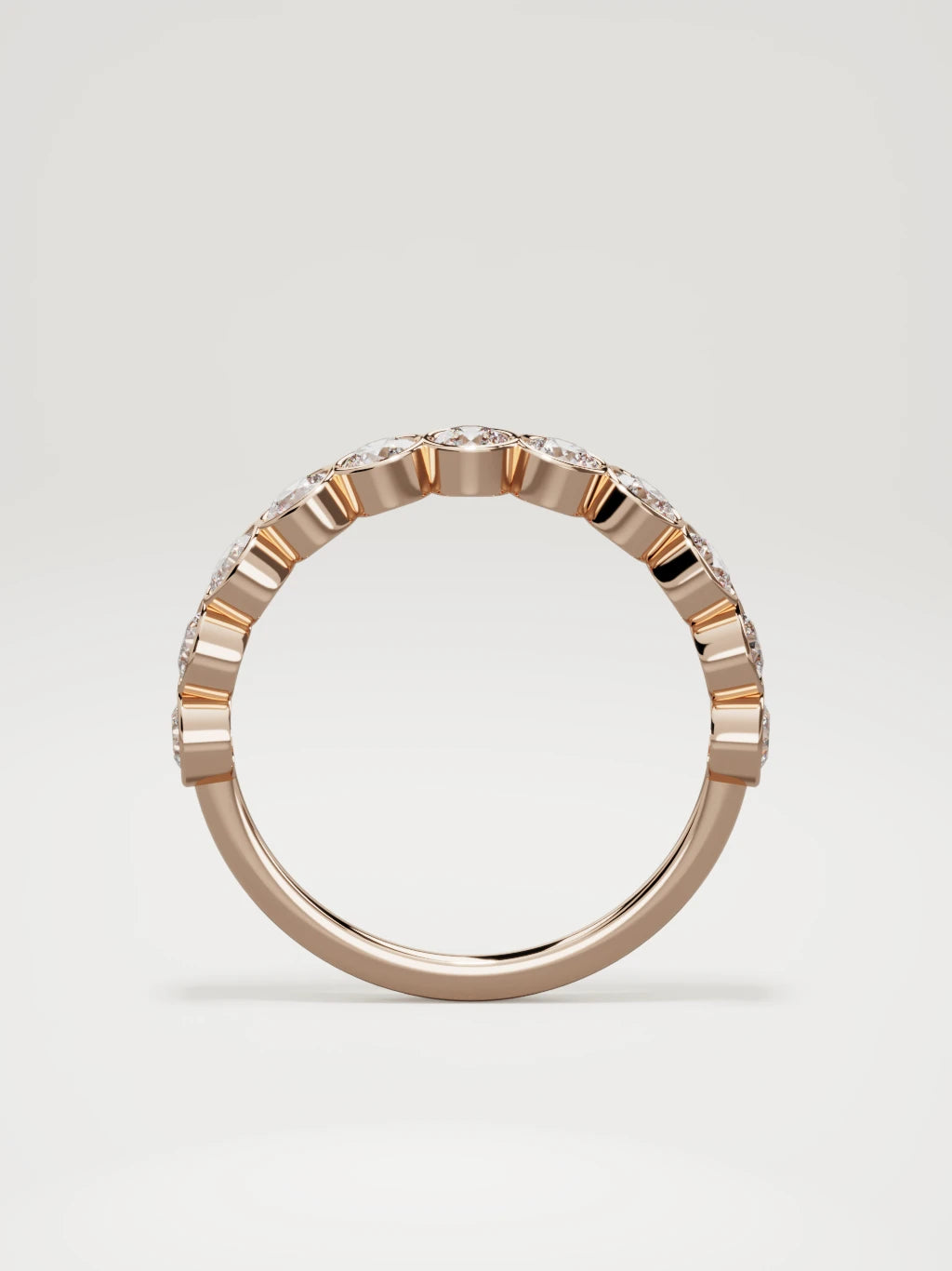 The Perla bezel bubble half eternity band in 14K rose gold, standing front view