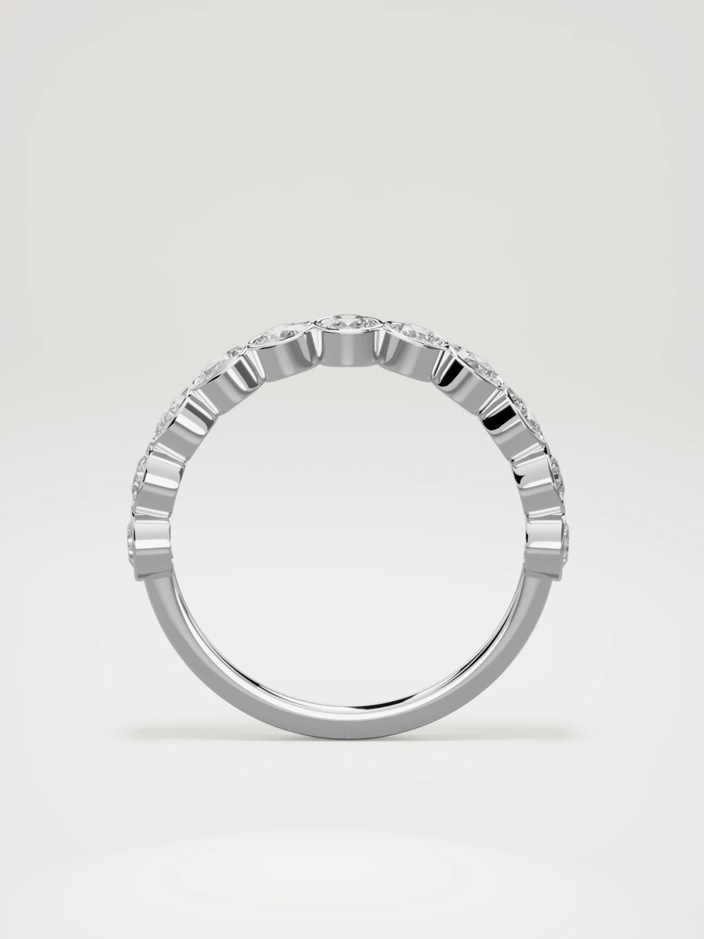 The Perla bezel bubble half eternity band in 14K white gold, standing front view