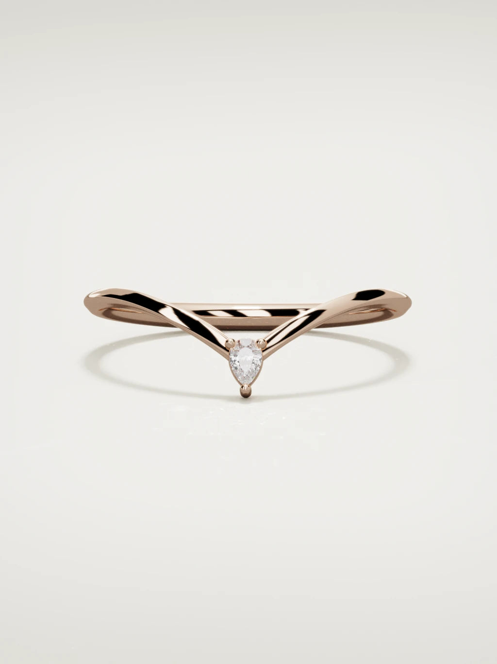 The Pico chevron pear diamond band in 14K rose gold, front view