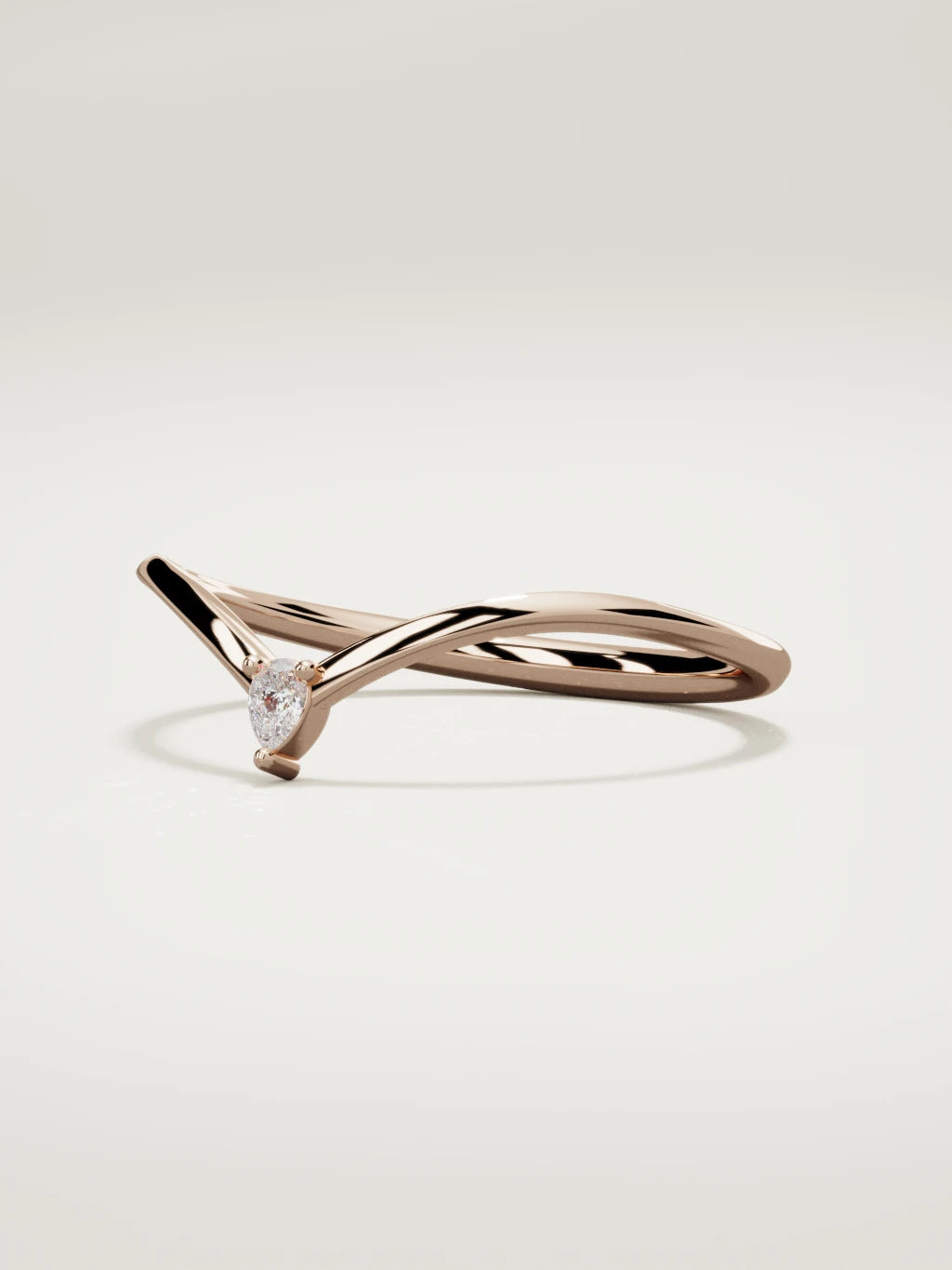 The Pico chevron pear diamond band in 14K rose gold, three-quarter view
