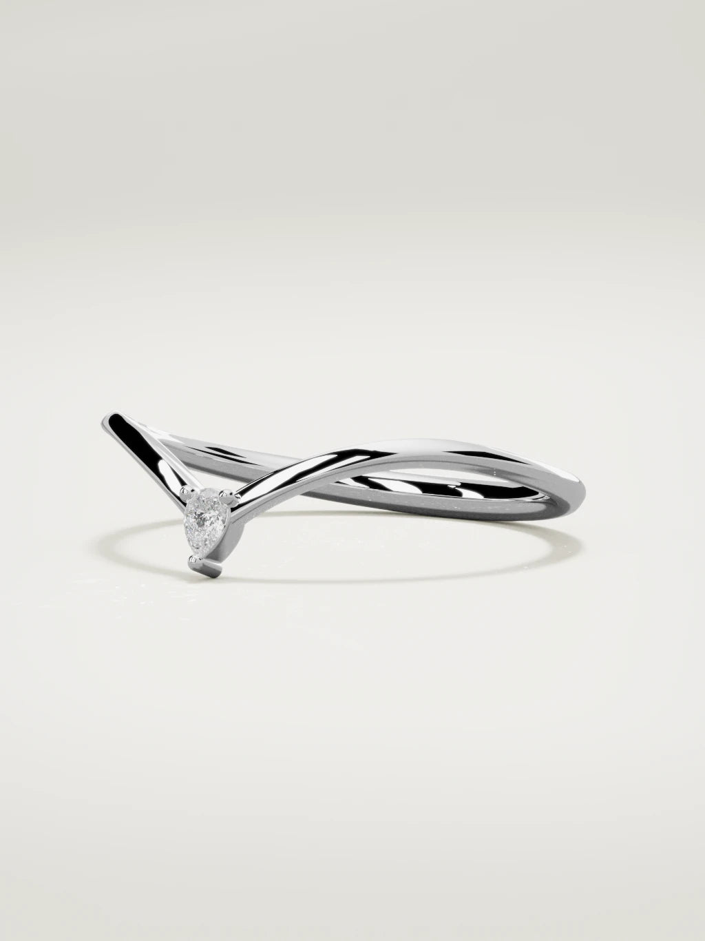 The Pico chevron pear diamond band in 14K white gold, three-quarter view