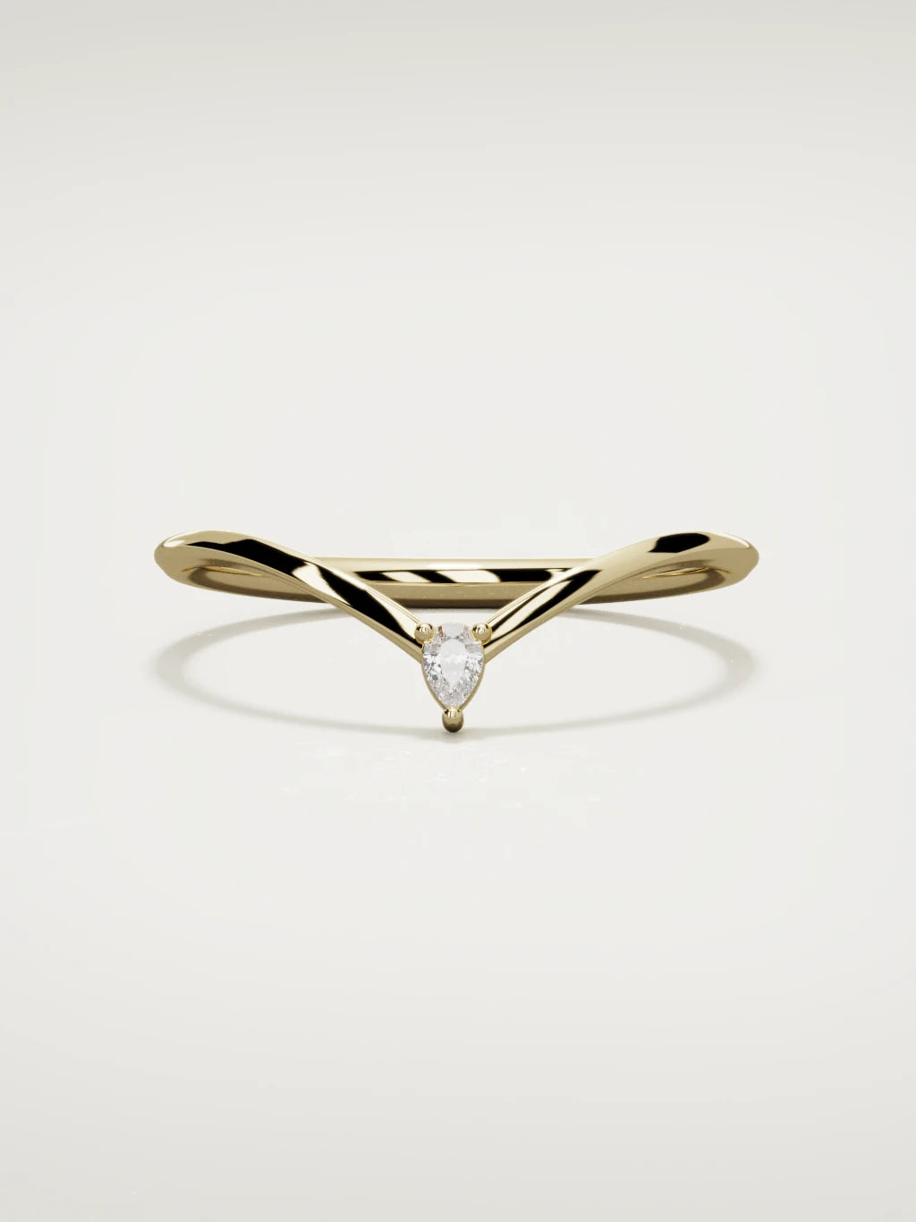 The Pico chevron pear diamond band in 14K yellow gold, front view