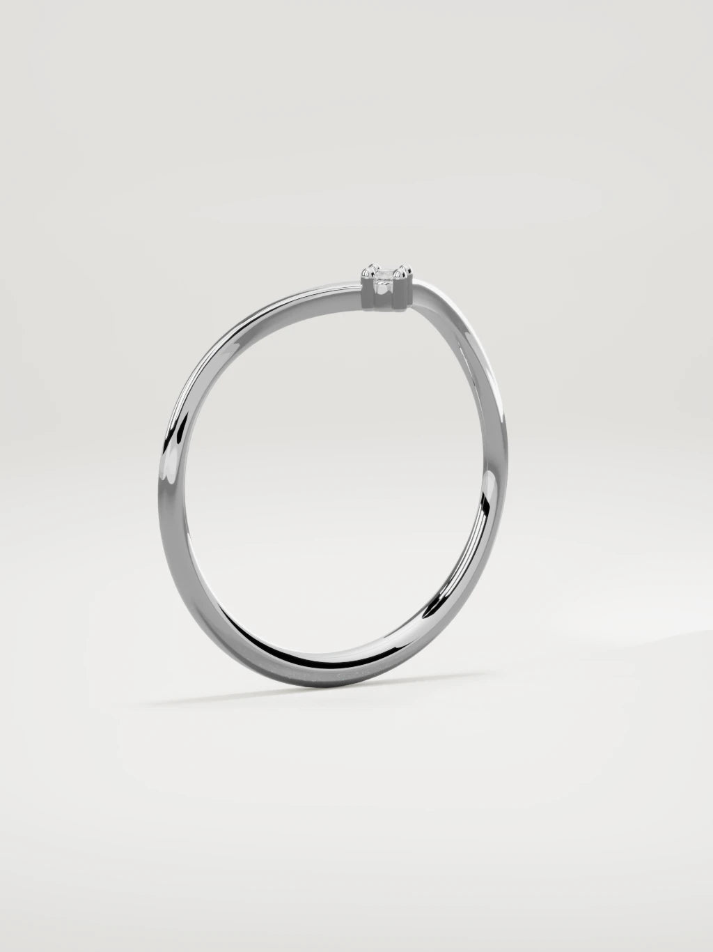 The Pico chevron round diamond band in 14K white gold, standing three-quarter view