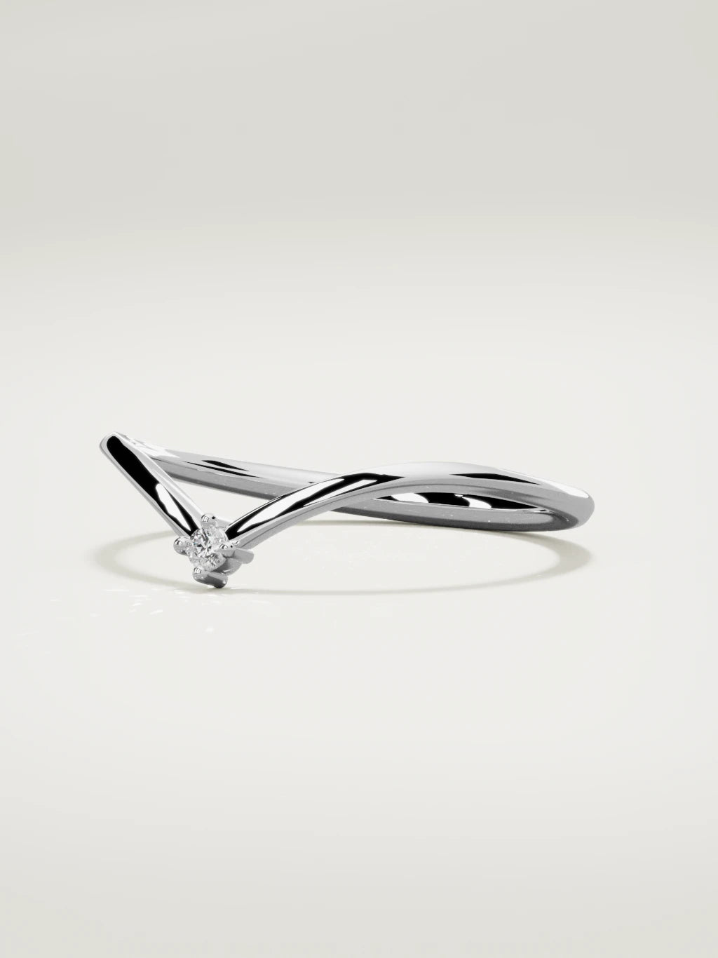 The Pico chevron round diamond band in 14K white gold, three-quarter view