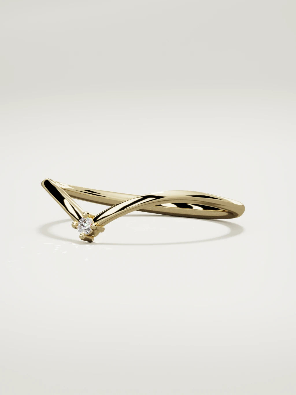 The Pico chevron round diamond band in 14K yellow gold, three-quarter view