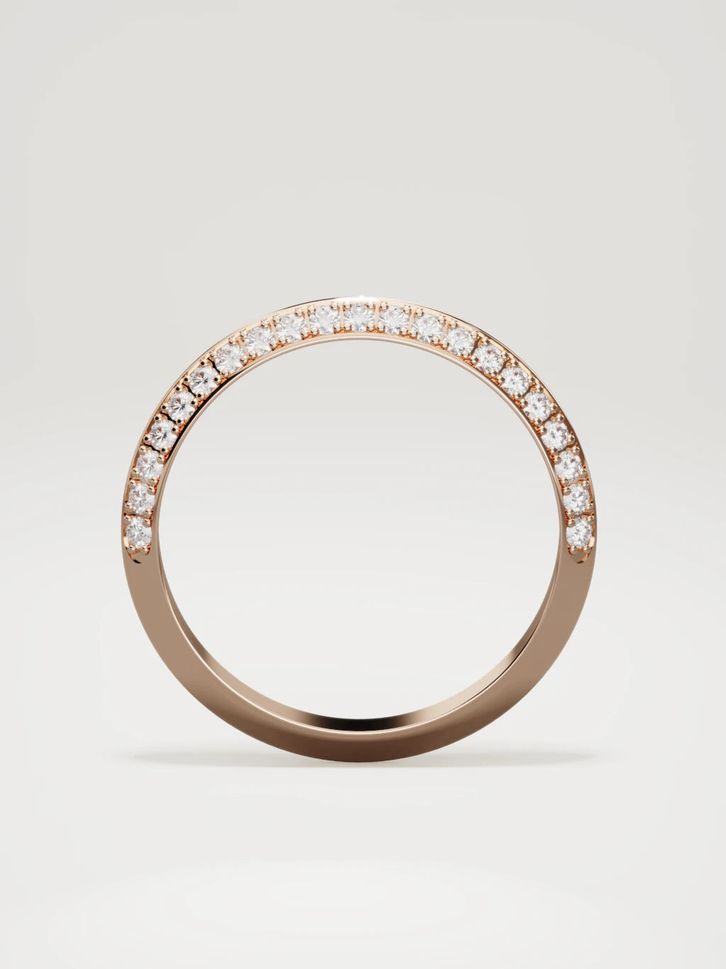 The Rayo diamond knife-edge men's band in 14K rose gold, 3 mm, standing front view