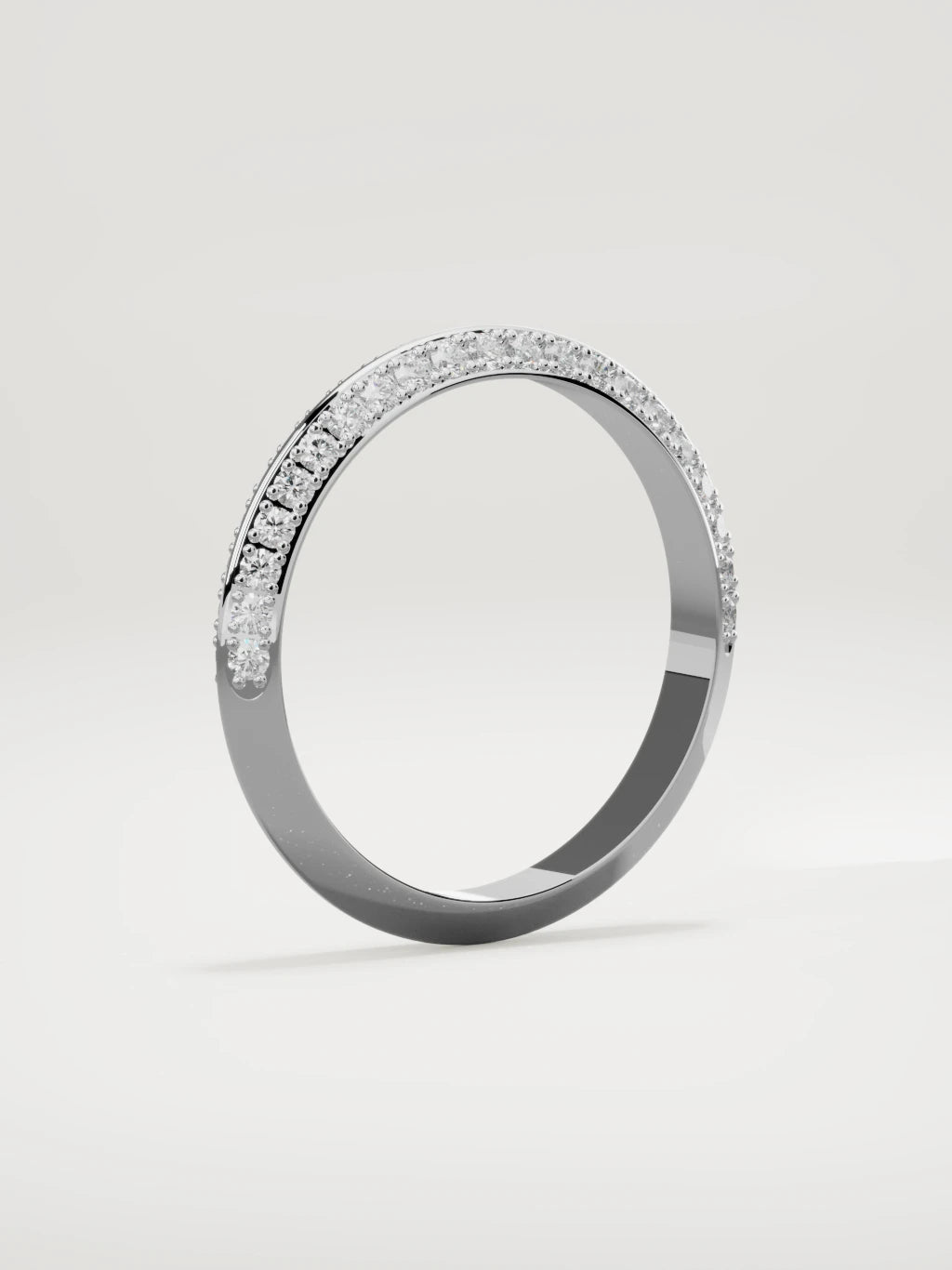 The Rayo diamond knife-edge men's band in 14K white gold, 3 mm, standing three-quarter view
