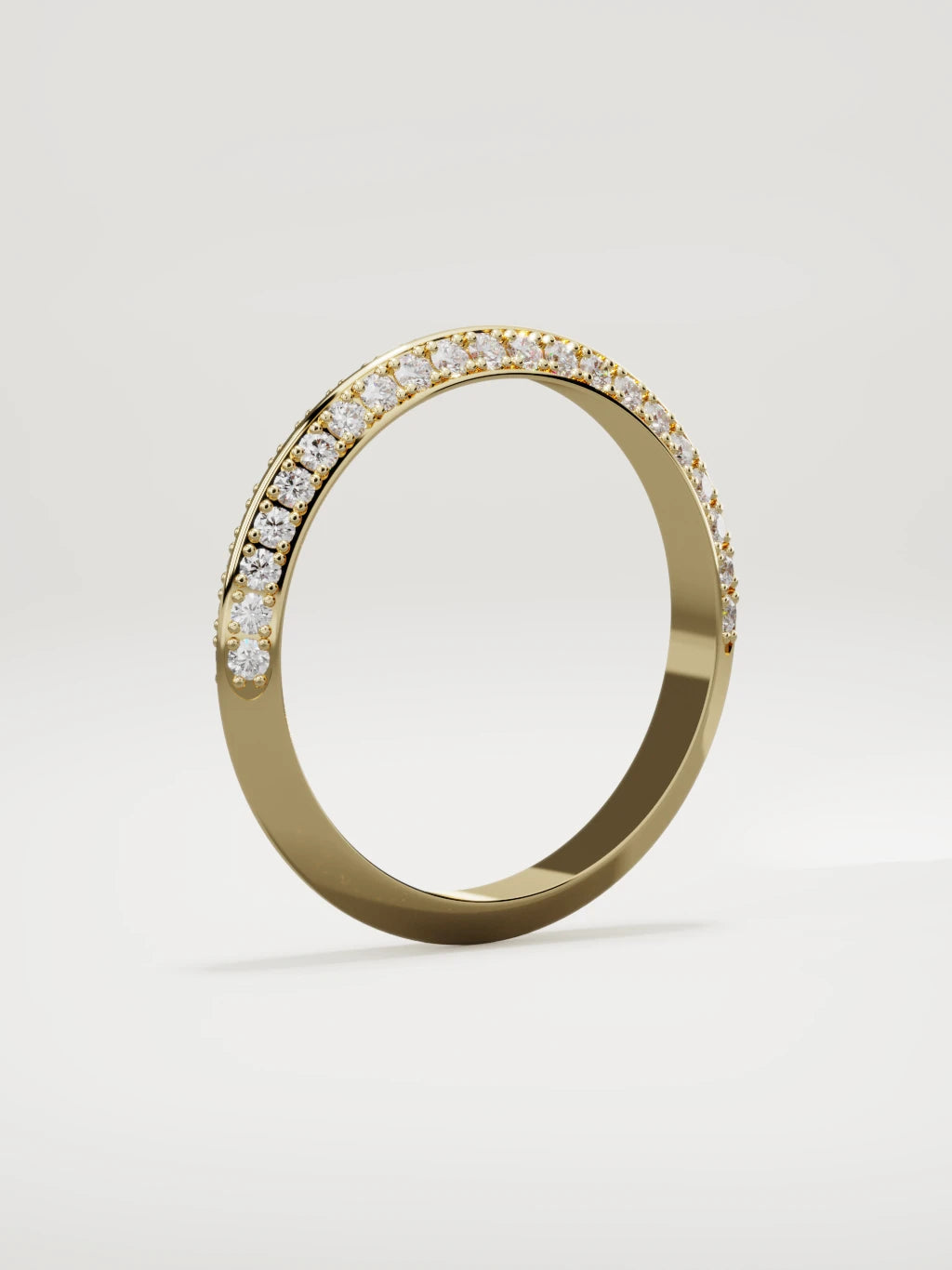 The Rayo diamond knife-edge men's band in 14K yellow gold, 3 mm, standing three-quarter view