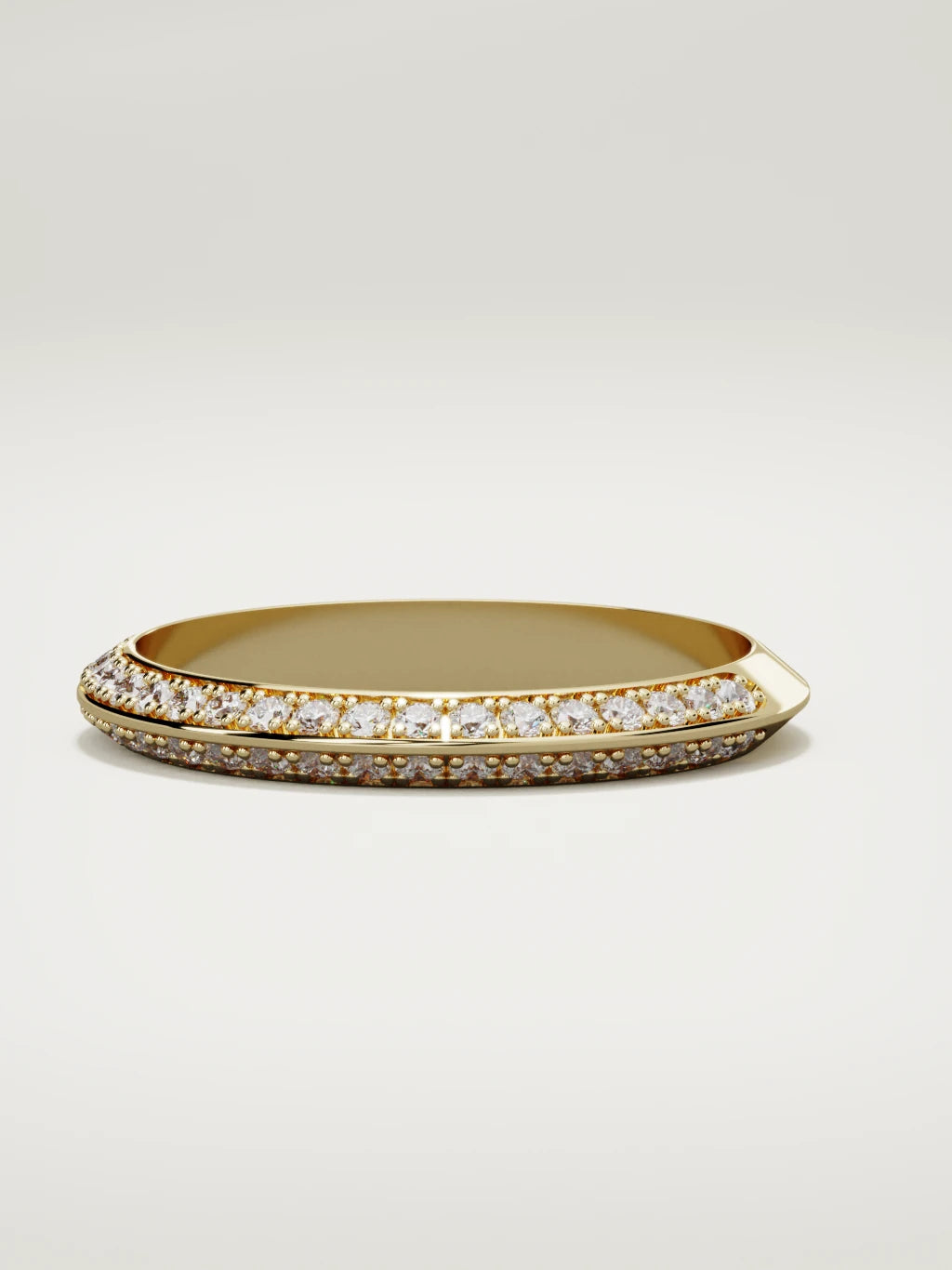 The Rayo diamond knife-edge men's band in 14K yellow gold, 3 mm, three-quarter view