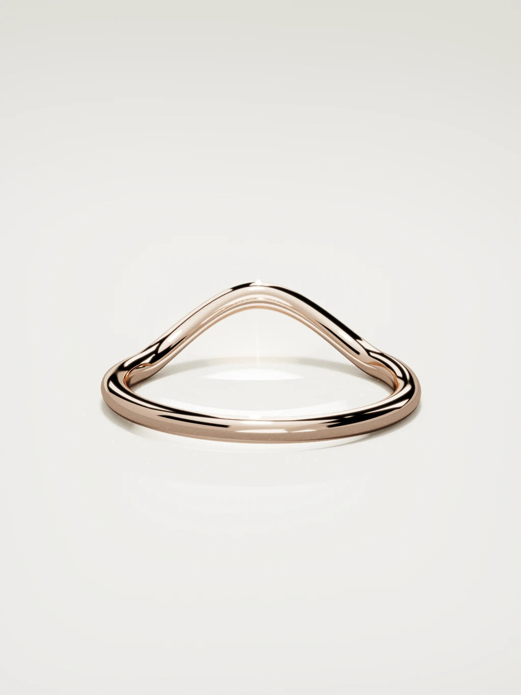 The Rima rounded contour wedding band in 14K rose gold, back view