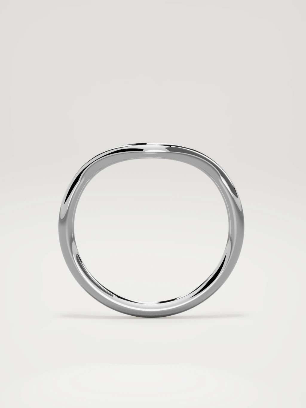 The Rima rounded contour wedding band in 14K white gold, standing front view