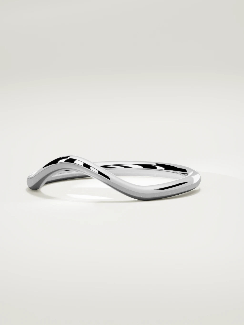 The Rima rounded contour wedding band in 14K white gold, three-quarter view