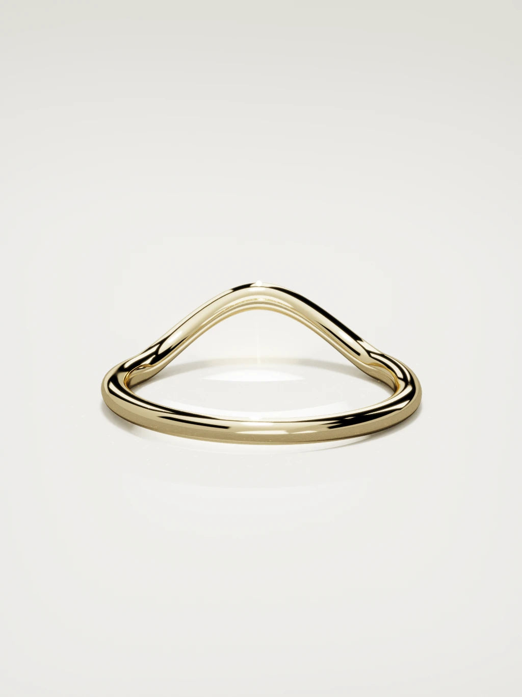 The Rima rounded contour wedding band in 14K yellow gold, back view