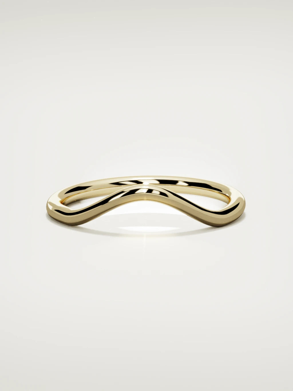 The Rima rounded contour wedding band in 14K yellow gold, front view