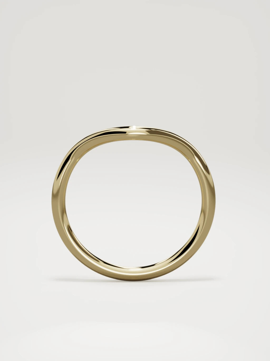 The Rima rounded contour wedding band in 14K yellow gold, standing front view