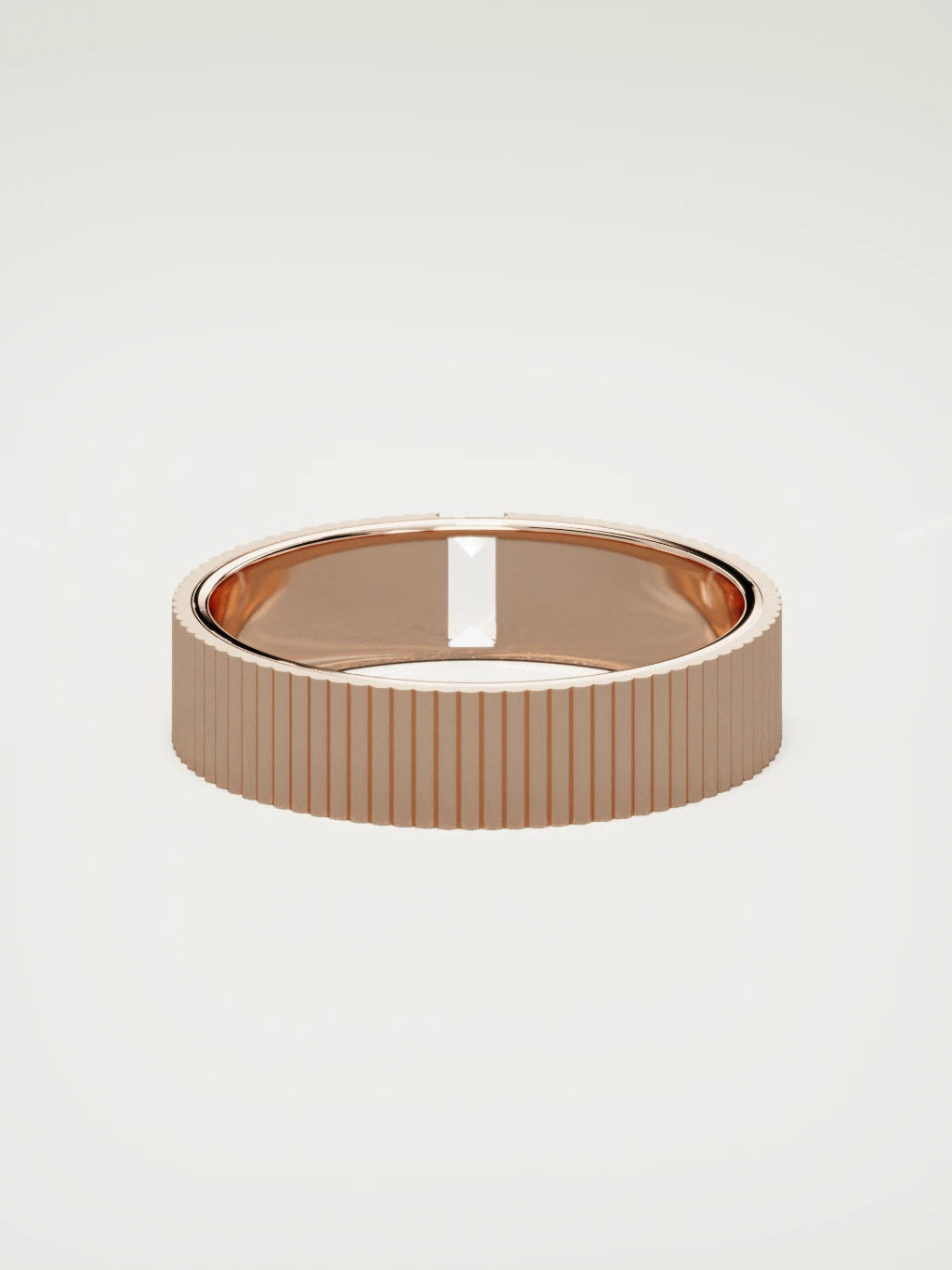 The Ritmo fluted baguette men's wedding band in 14K rose gold, 5 mm, back view