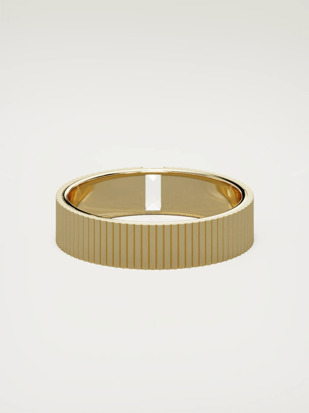The Ritmo fluted baguette men's wedding band in 14K yellow gold, 5 mm, back view