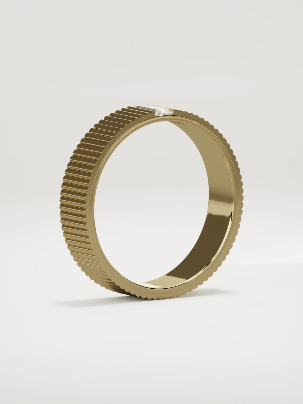 The Ritmo fluted baguette men's wedding band in 14K yellow gold, 5 mm, standing three-quarter view
