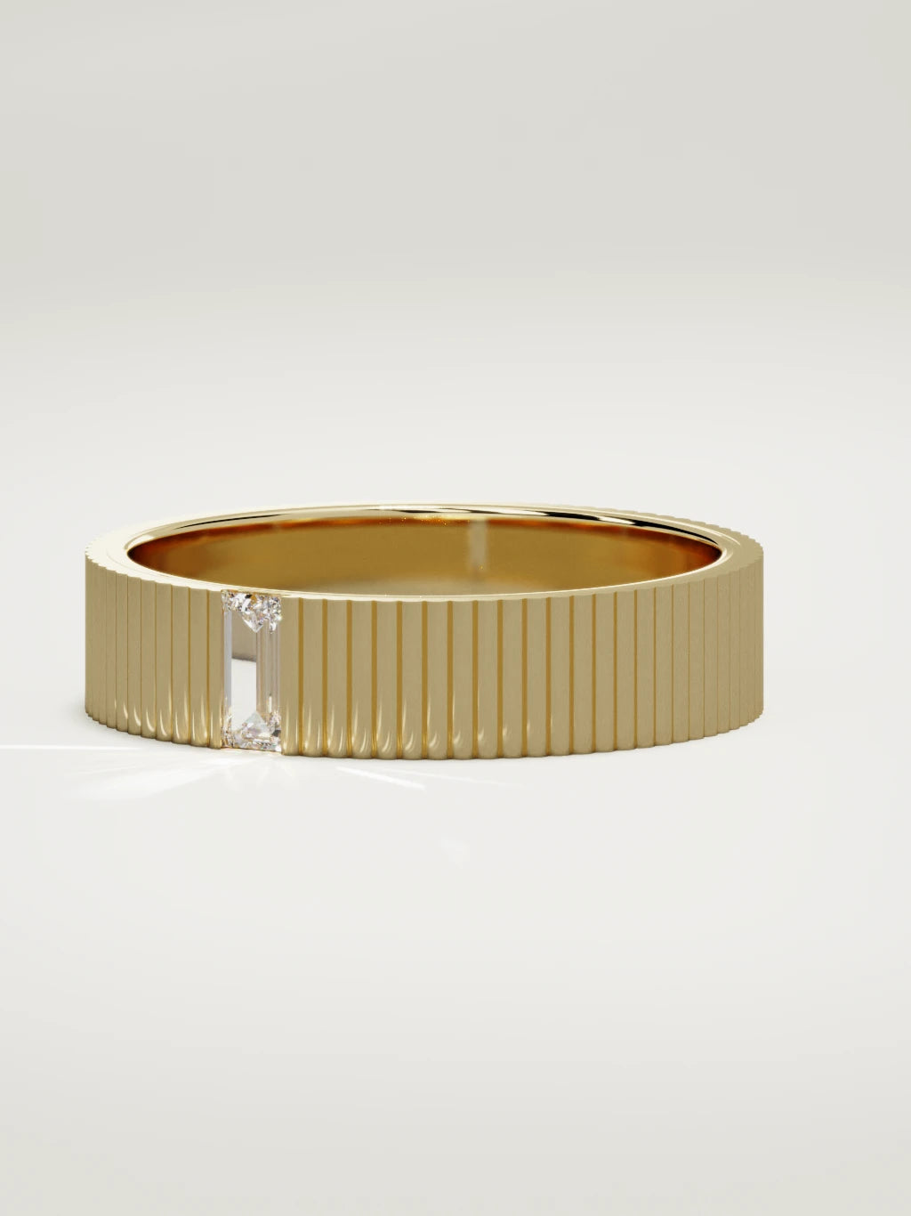 The Ritmo fluted baguette men's wedding band in 14K yellow gold, 5 mm, three-quarter view