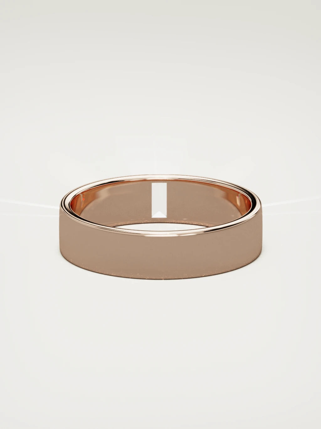 The Solo flat baguette men's wedding band in 14K rose gold, 5 mm, back view