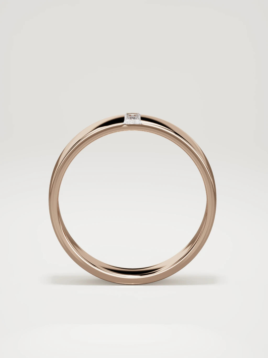 The Solo flat baguette men's wedding band in 14K rose gold, 5 mm, standing front view
