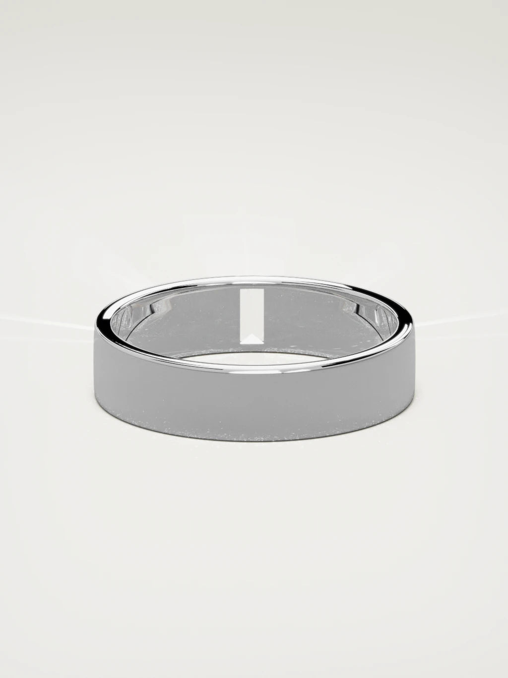 The Solo flat baguette men's wedding band in 14K white gold, 5 mm, back view