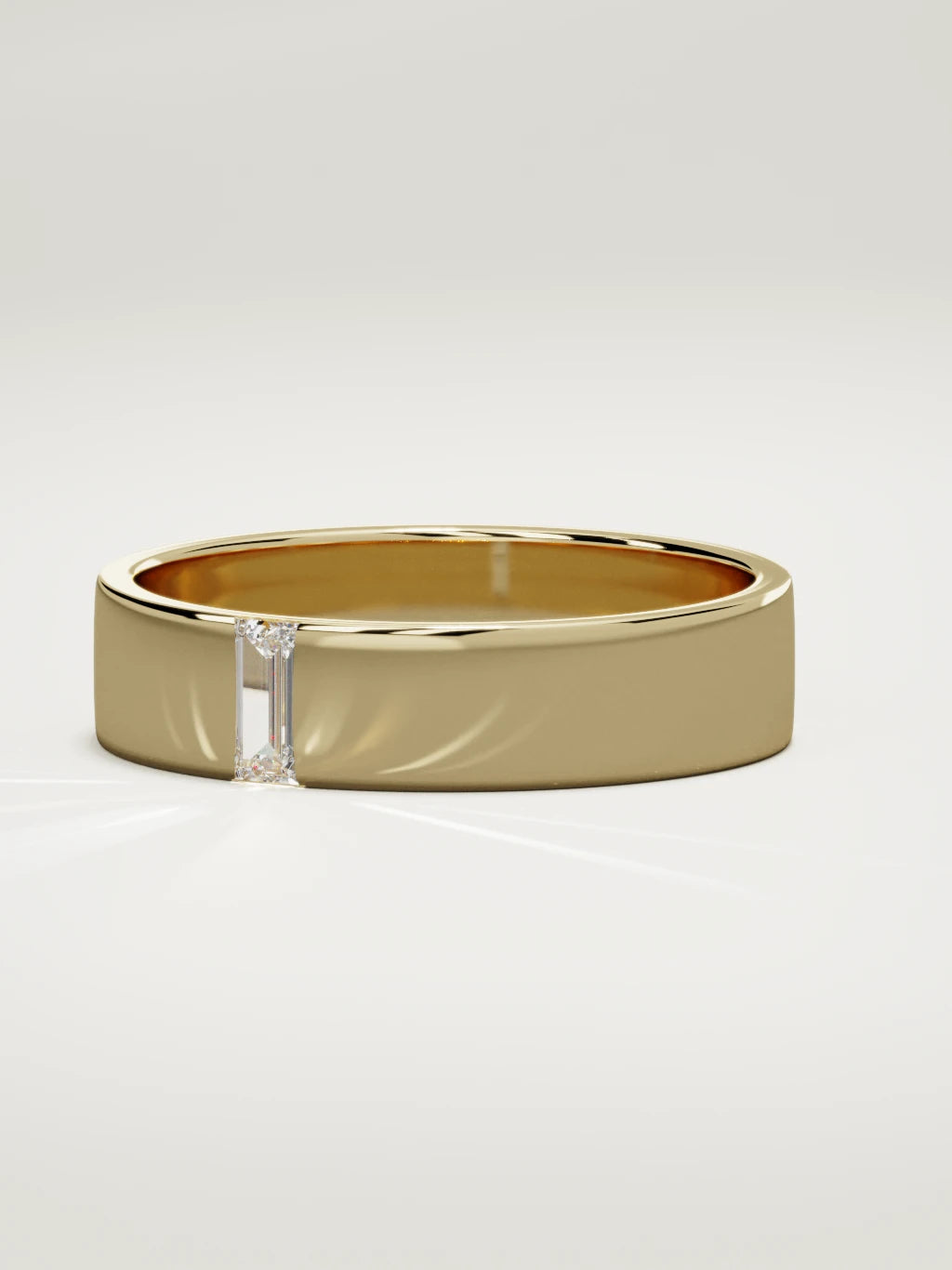 The Solo flat baguette men's wedding band in 14K yellow gold, 5 mm, three-quarter view
