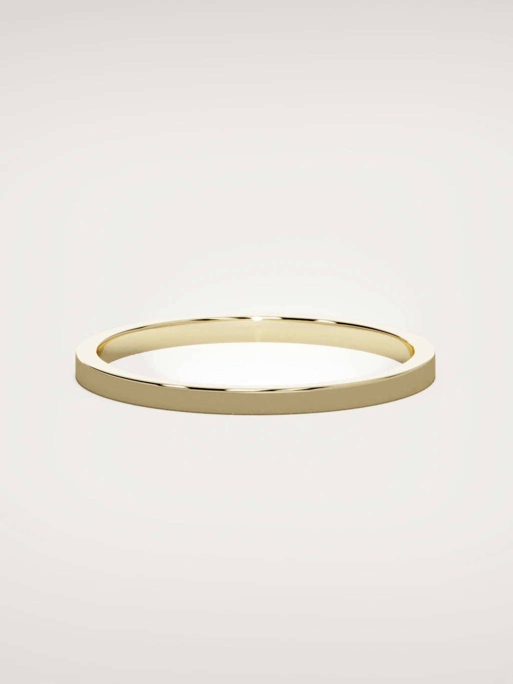 The Noble flat men's wedding band in 14K yellow gold, 2 mm, front view
