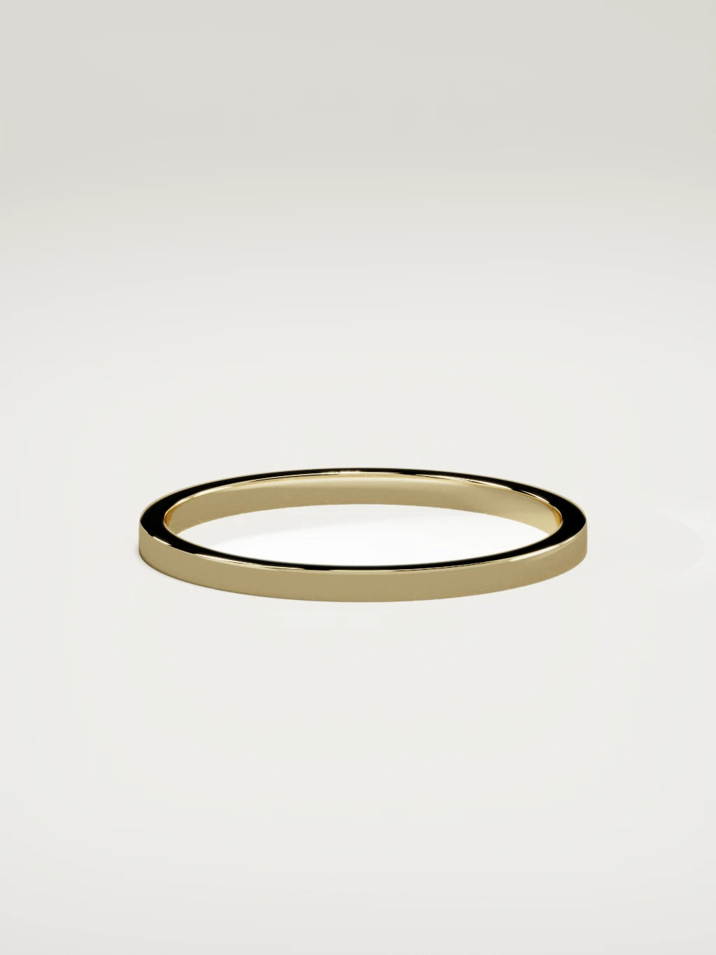 The Noble flat men's wedding band in 14K yellow gold, 2 mm, side view