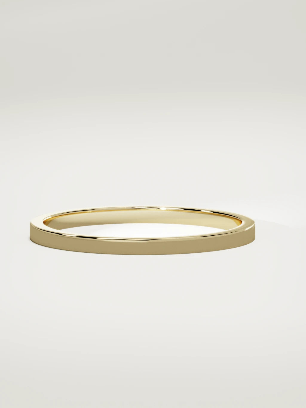 The Noble flat men's wedding band in 14K yellow gold, 2 mm, three-quarter view