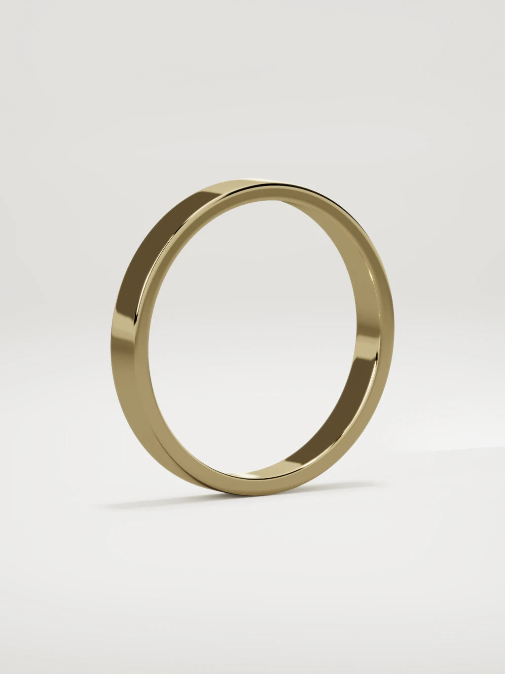 The Noble flat men's wedding band in 14K yellow gold, 3 mm, standing three-quarter view