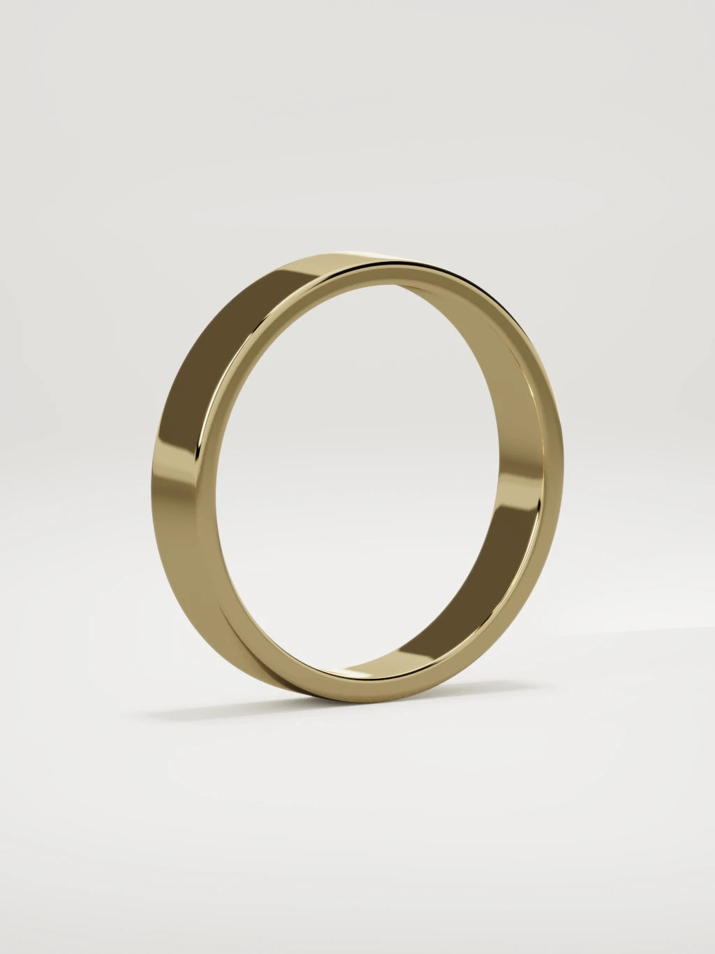 The Noble flat men's wedding band in 14K yellow gold, 4 mm, standing three-quarter view