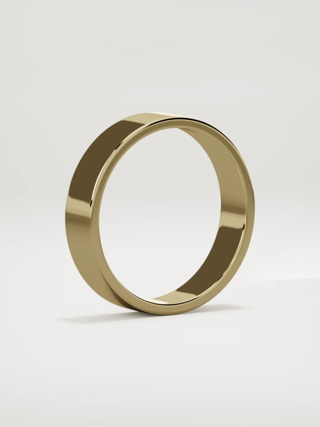 The Noble flat men's wedding band in 14K yellow gold, 5 mm, standing three-quarter view