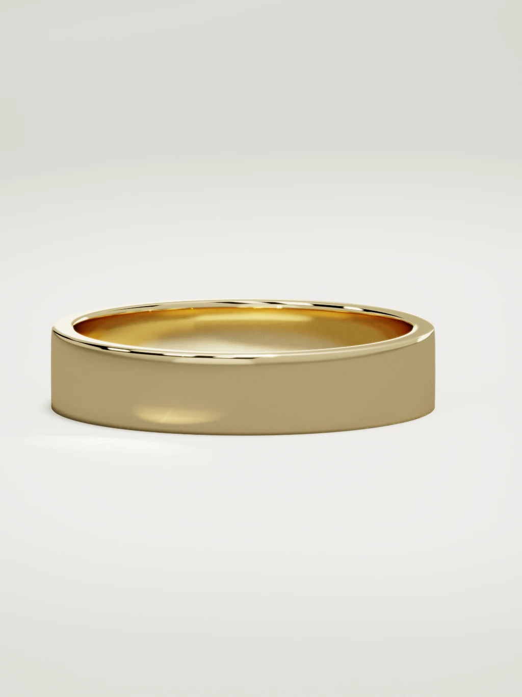 The Noble flat men's wedding band in 14K yellow gold, 5 mm, three-quarter view