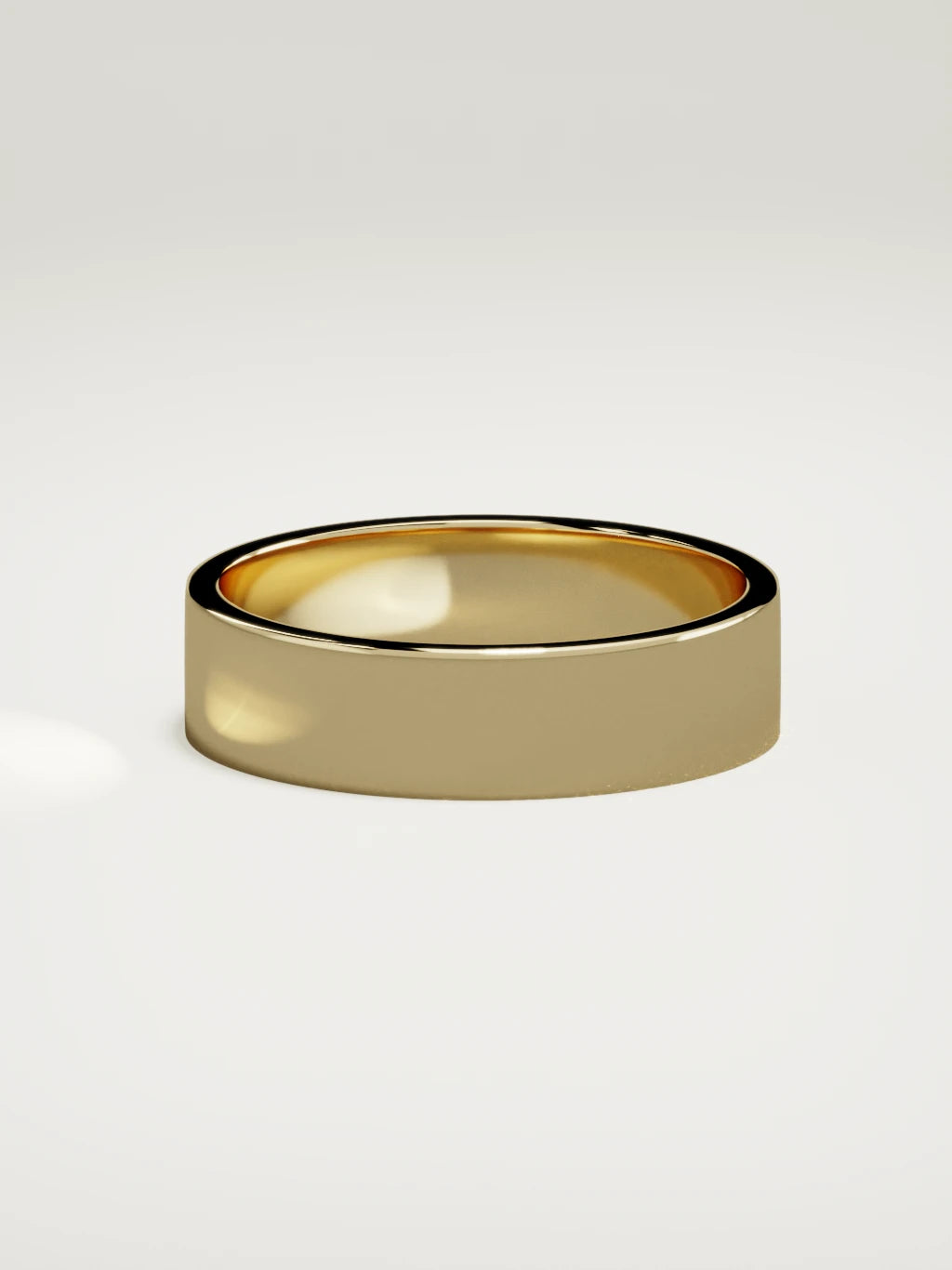 The Noble flat men's wedding band in 14K yellow gold, 6 mm, side view