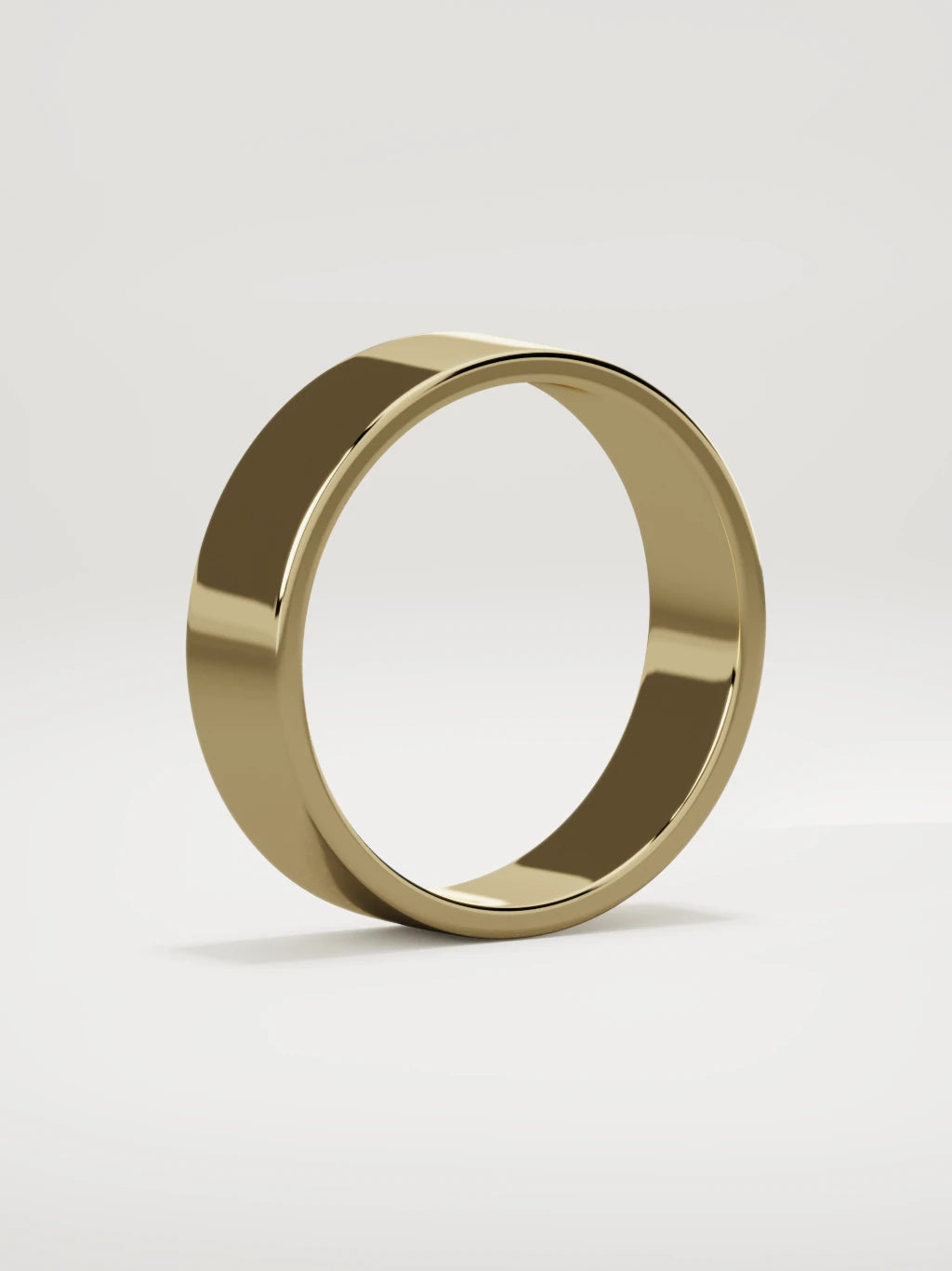 The Noble flat men's wedding band in 14K yellow gold, 6 mm, standing three-quarter view