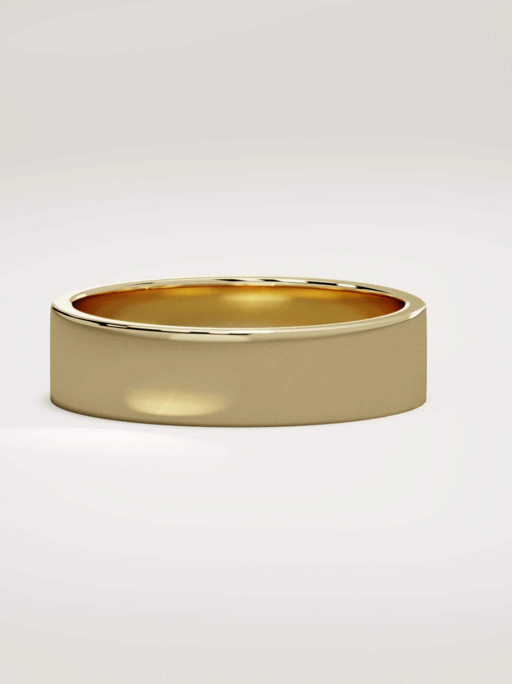 The Noble flat men's wedding band in 14K yellow gold, 6 mm, three-quarter view