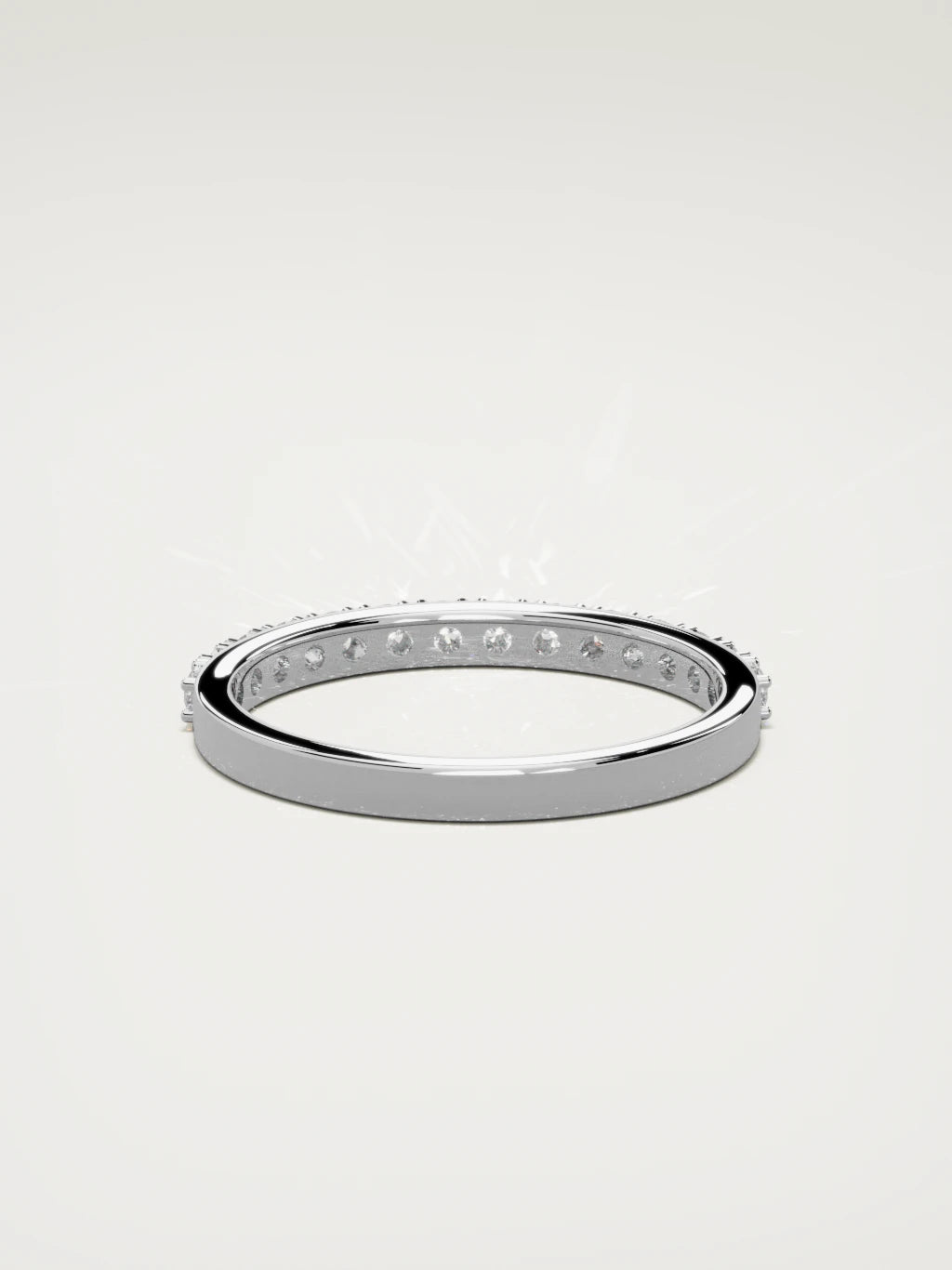 The Sutil low-profile petite half eternity band in 14K white gold, back view