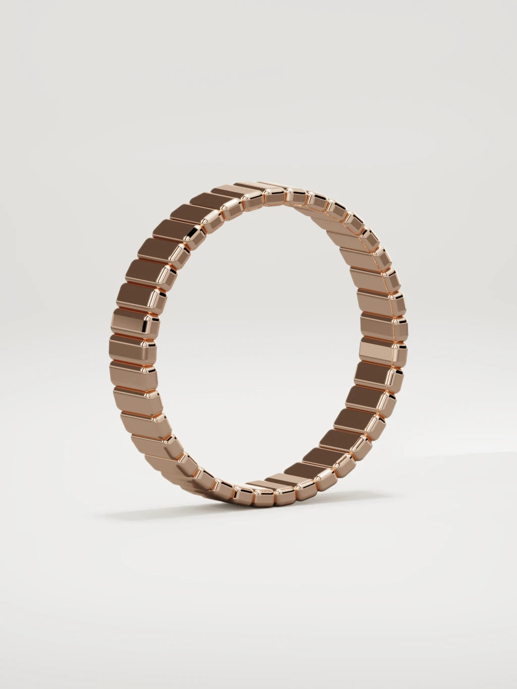 The Tempo ribbed men's wedding band in 14K rose gold, 5 mm, standing three-quarter view