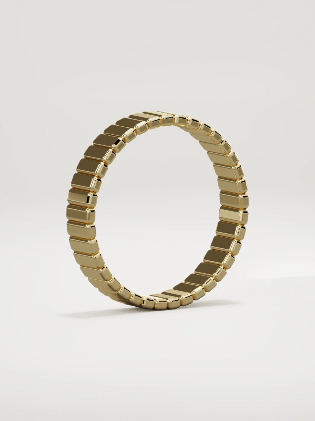The Tempo ribbed men's wedding band in 14K yellow gold, 5 mm, standing three-quarter view