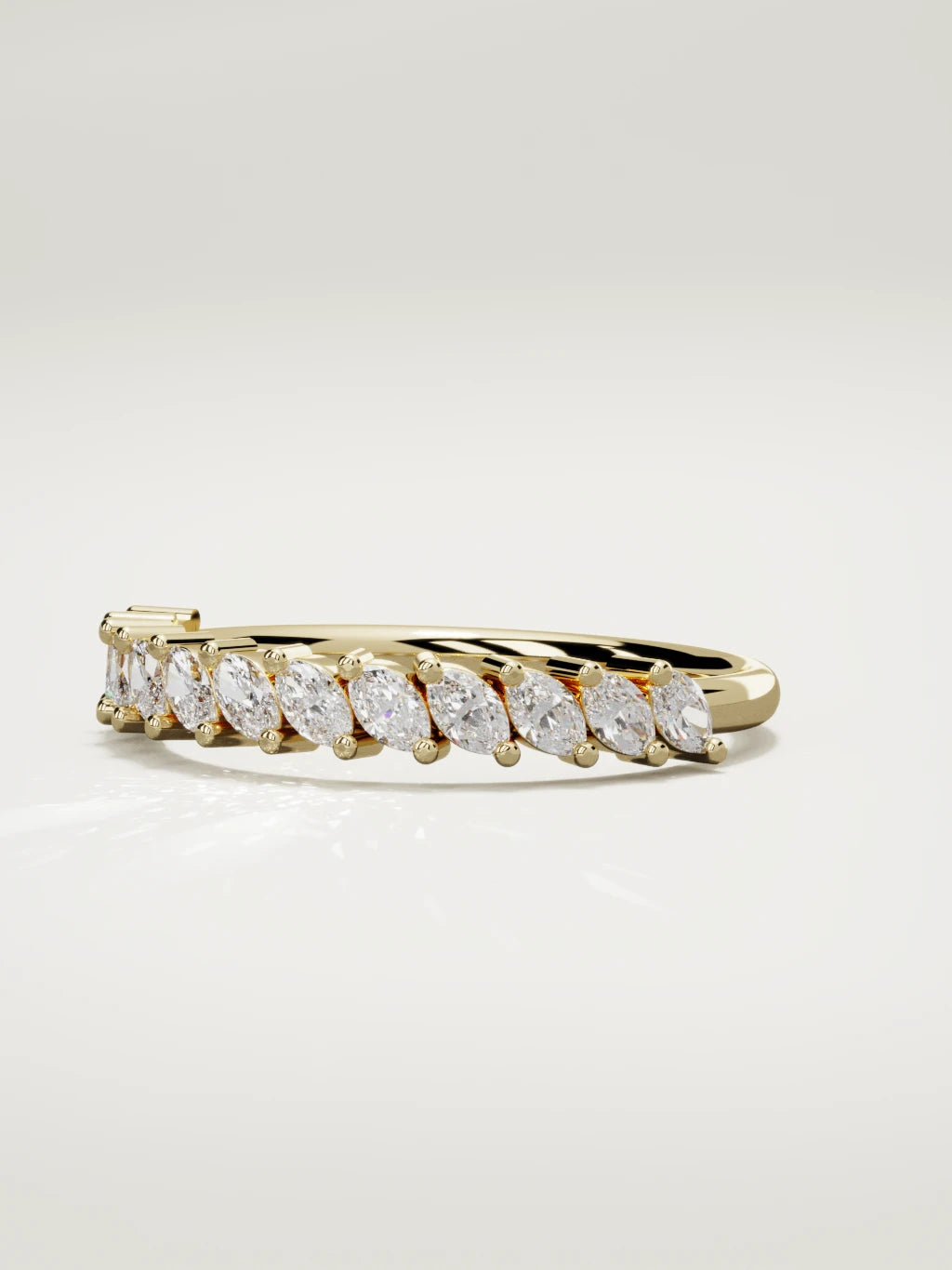 The Union marquise half eternity band in 14K yellow gold, three-quarter view