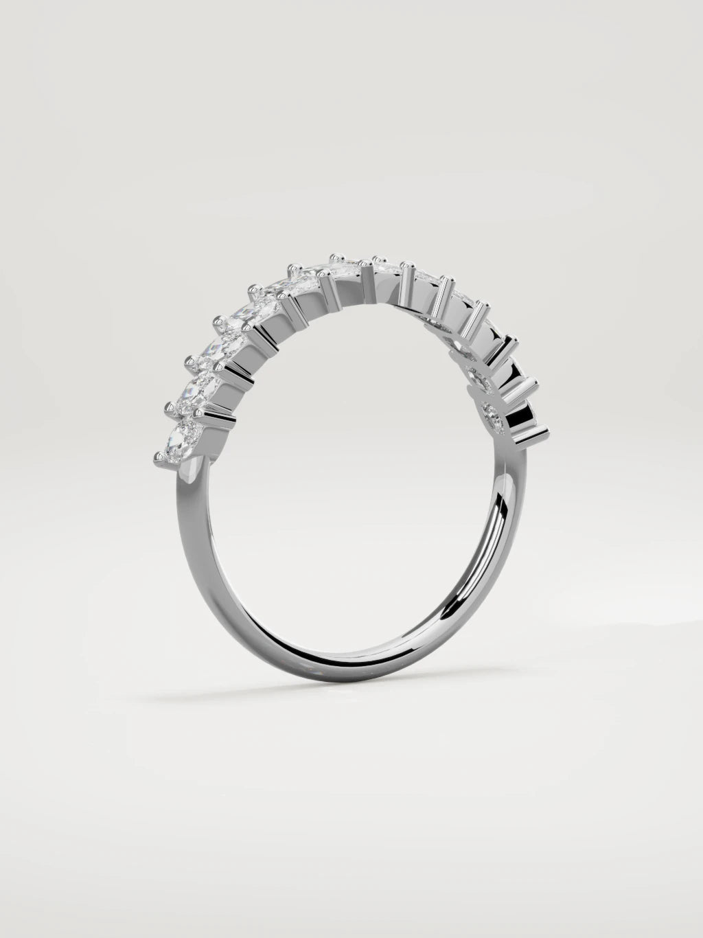 The Union marquise half eternity band in 14K white gold, standing three-quarter view