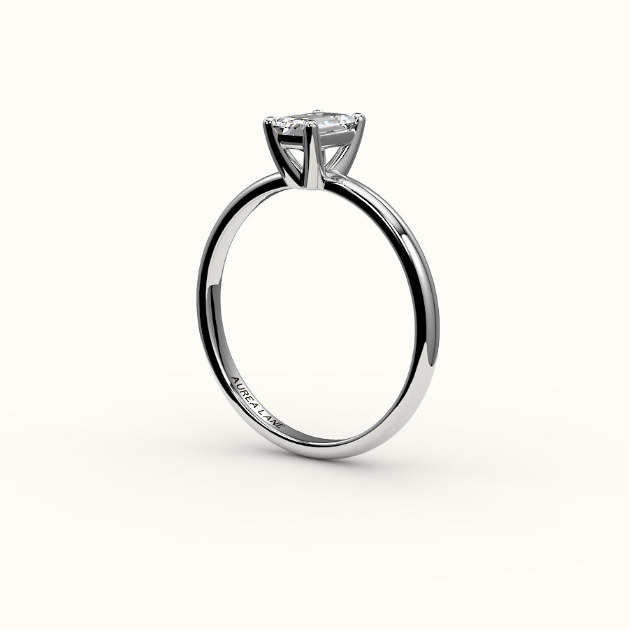 Engaste clásico de anillo solitario de talla esmeralda