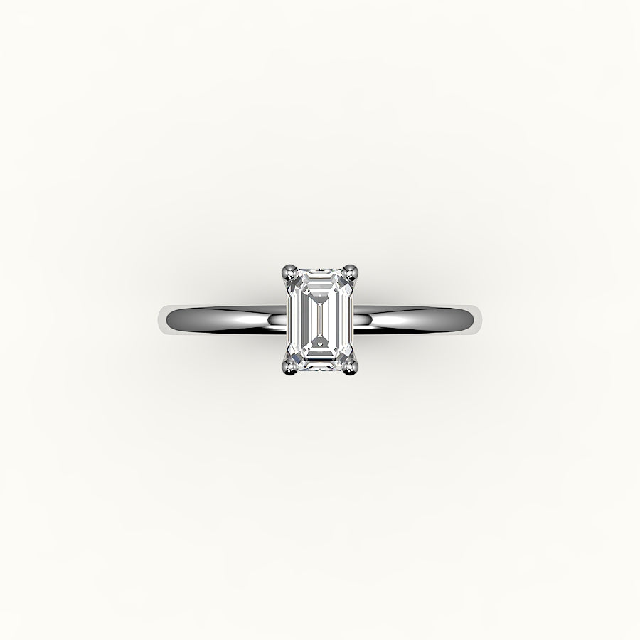 Engaste clásico de anillo solitario de talla esmeralda