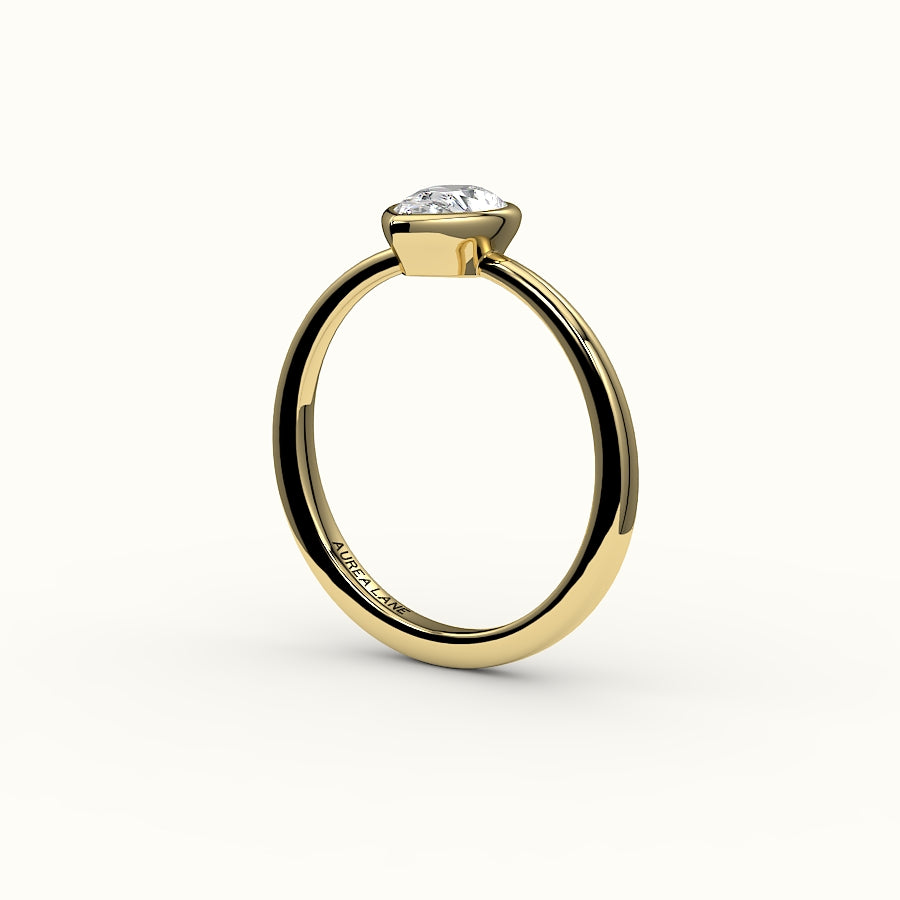 Engaste de anillo con bisel de corte de pera clásico