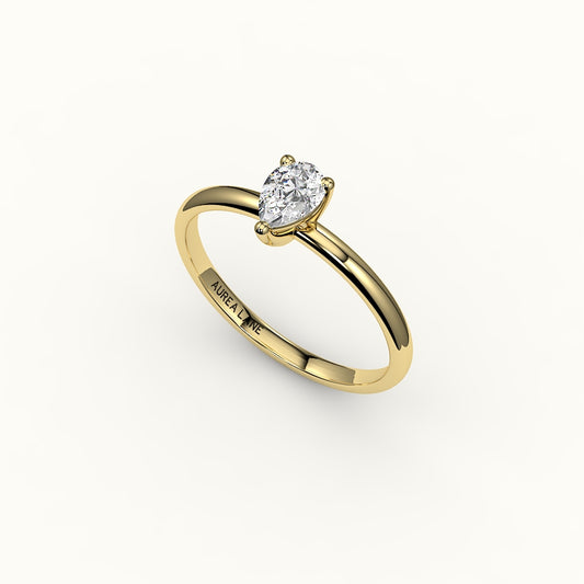 Engaste de anillo solitario clásico de corte de pera
