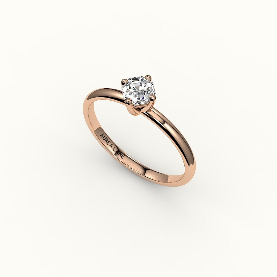 Anillo solitario con corte octogonal y brújula